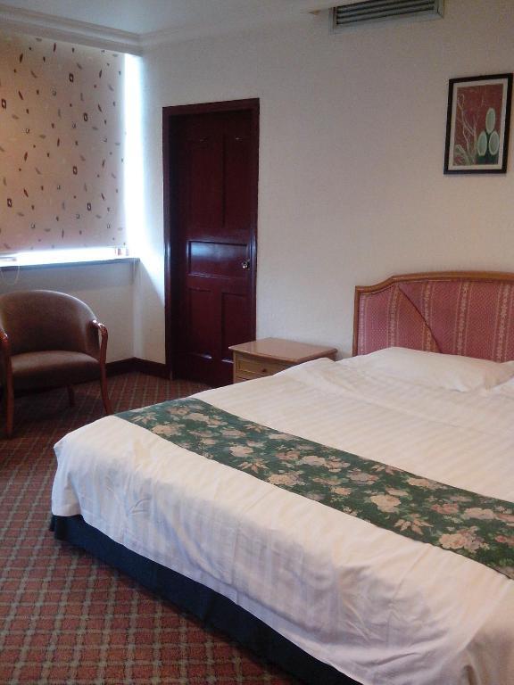 Garden City Hotel تشنجدو الغرفة الصورة