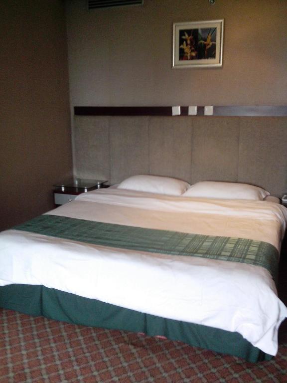 Garden City Hotel تشنجدو الغرفة الصورة